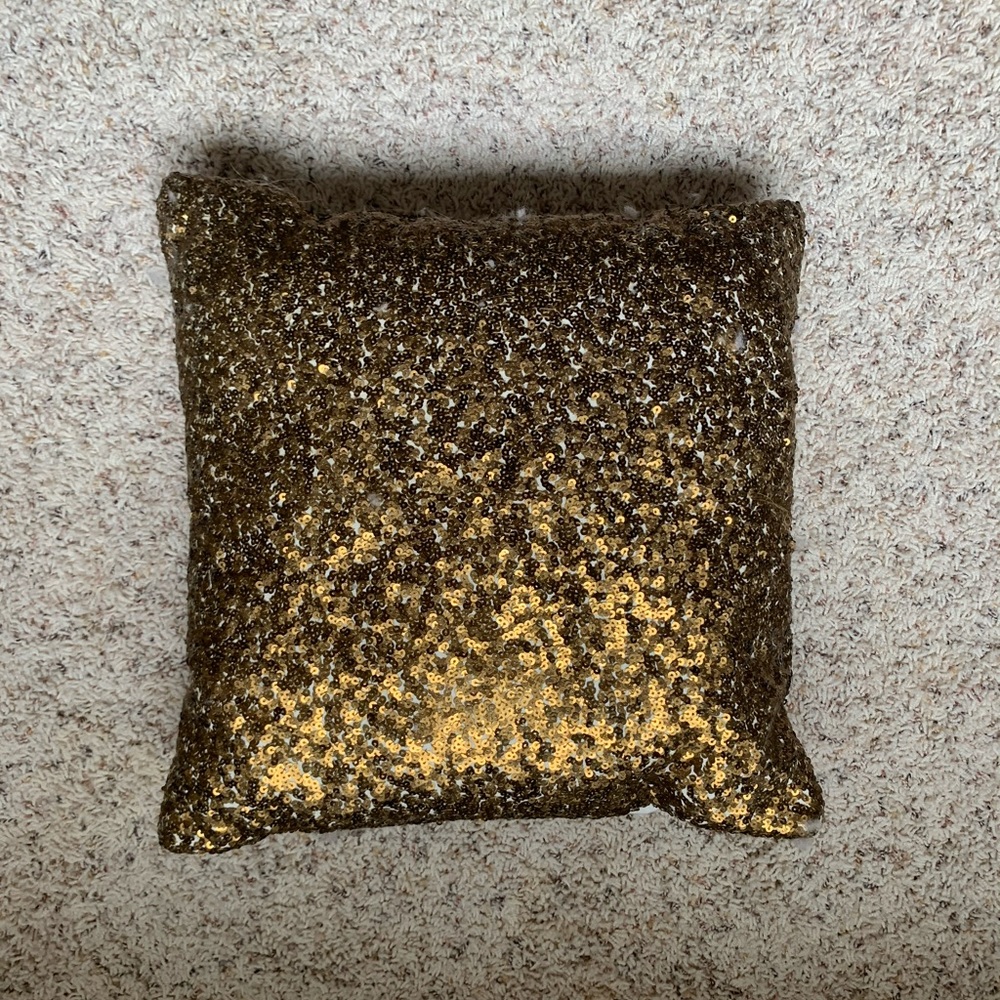 Gold throw pillow